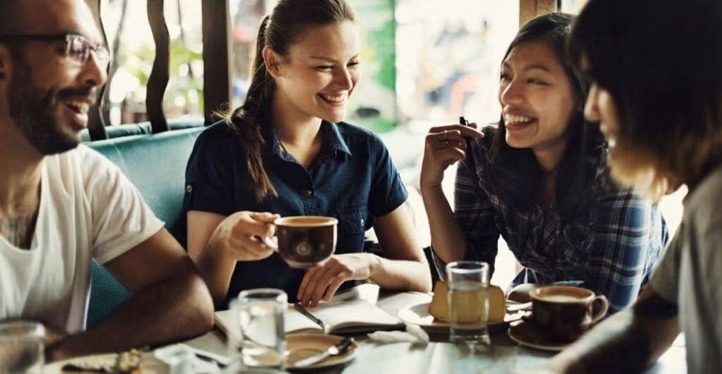 A group of friends having a meal together.